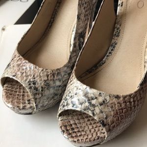 Women’s snakeskin heels.